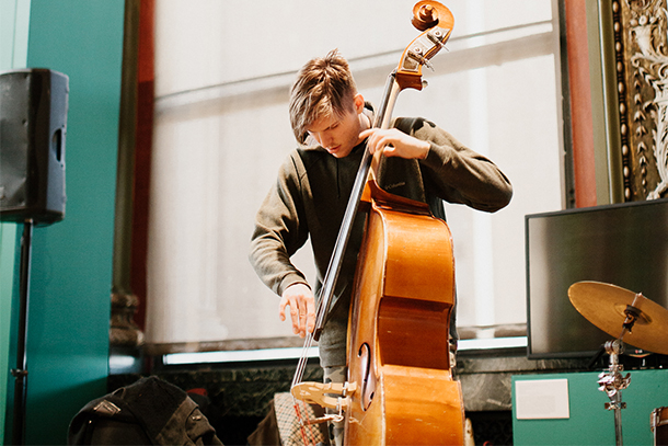 photo of person playing cello