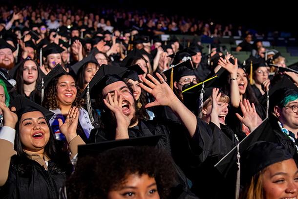 students celebrating at commencement ceremony