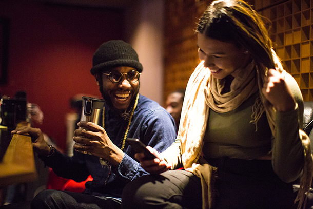 Cory Henry with a student