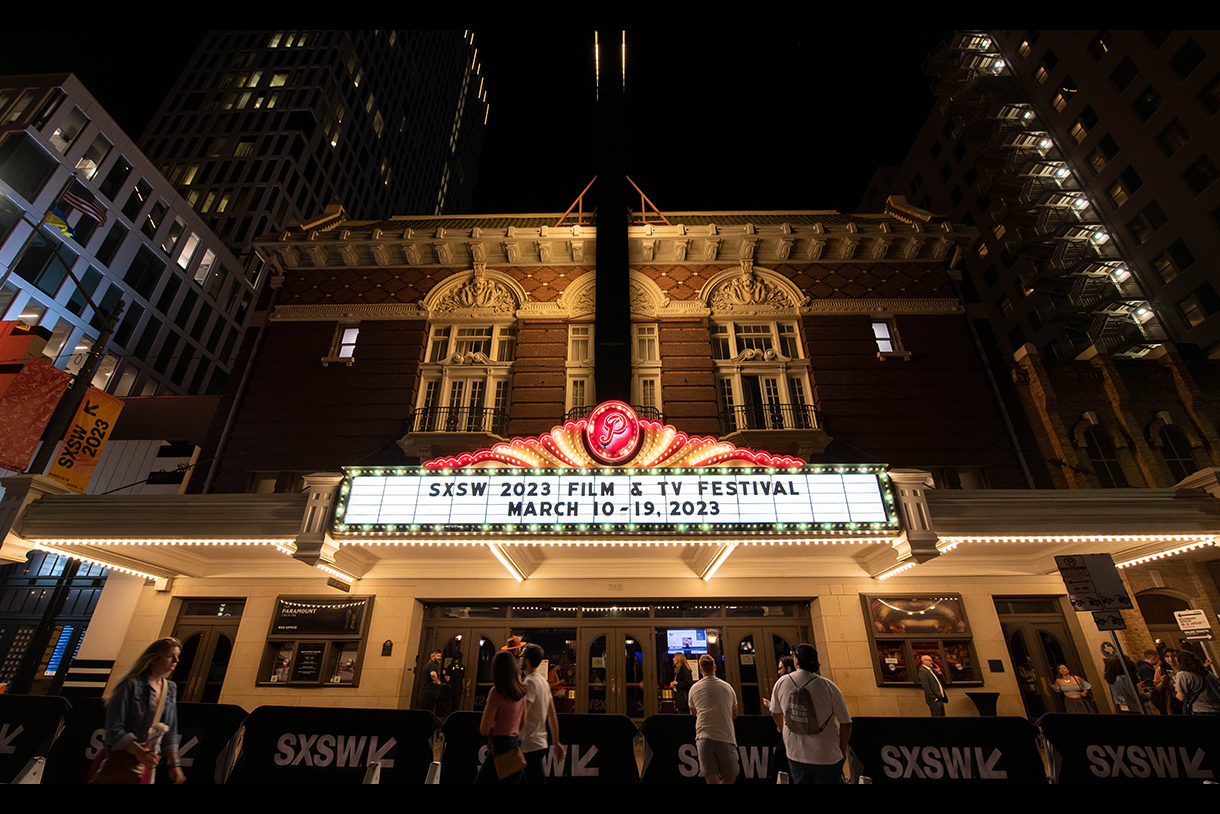 signage in front of the paramount theater with dates of sxsw, March 10 to 19.