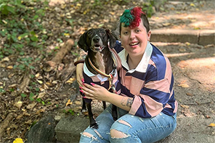 rebecca martin outside with their dog